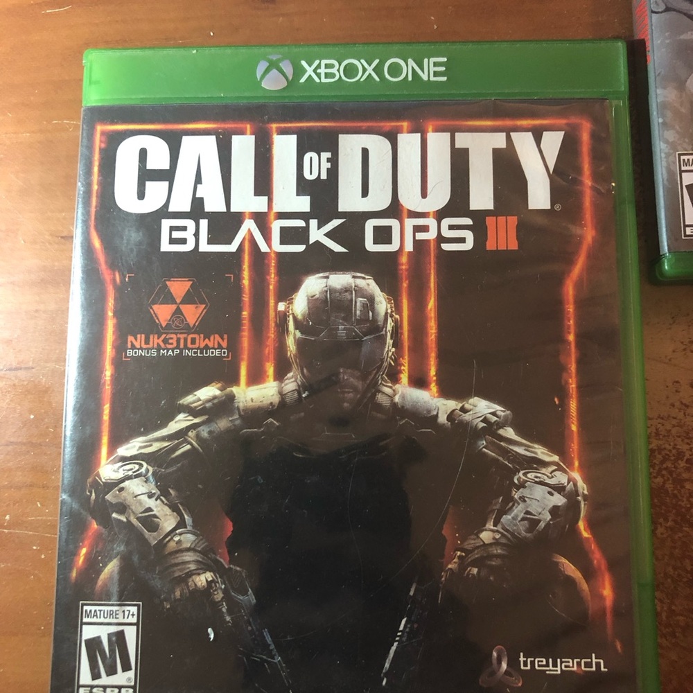 Green Video Game Case for Xbox One featuring Call of Duty Black Ops III